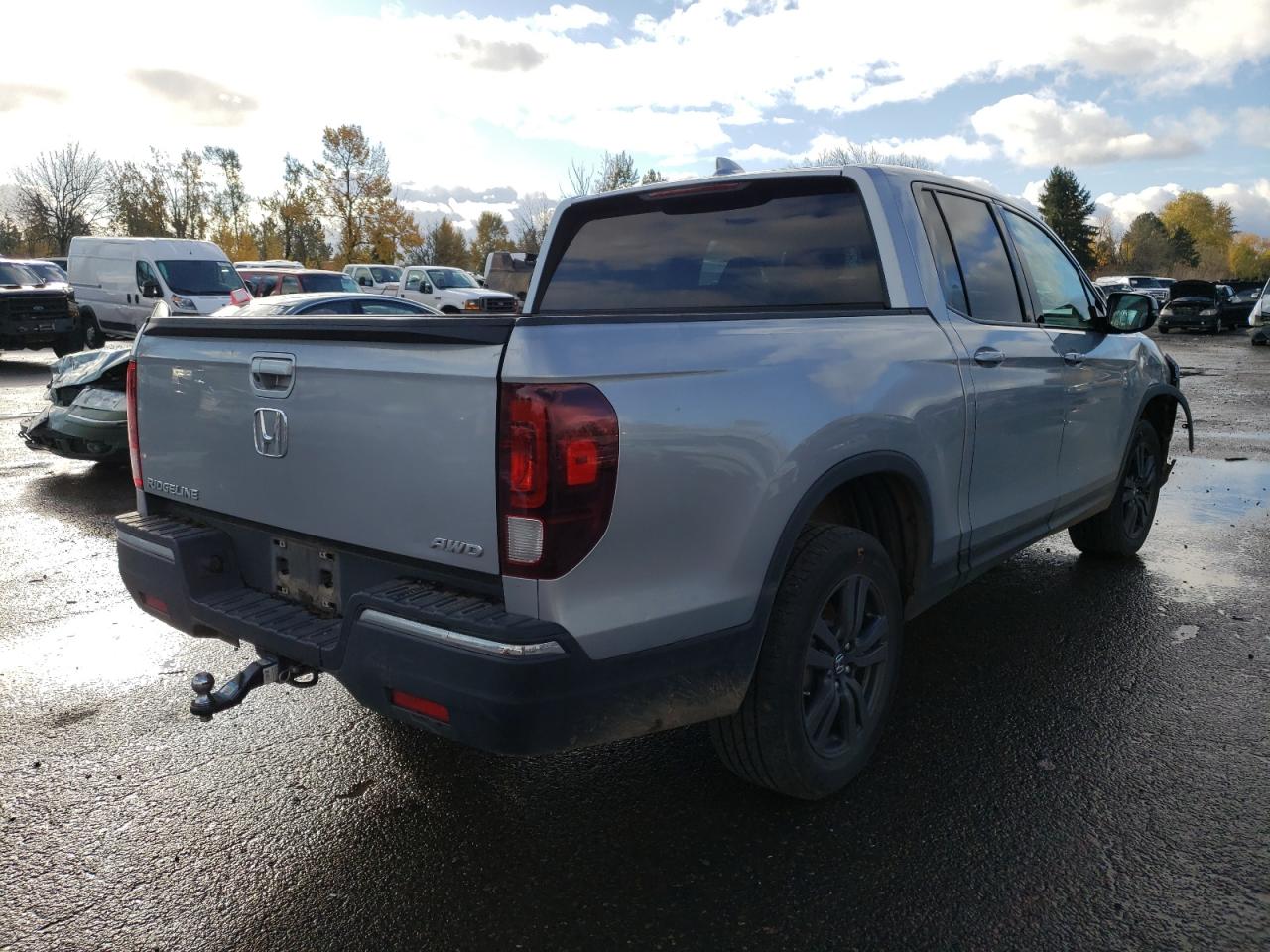 Photo 4 from auction – 2019 HONDA RIDGELINE with VIN 5FPYK3F11KB046902
