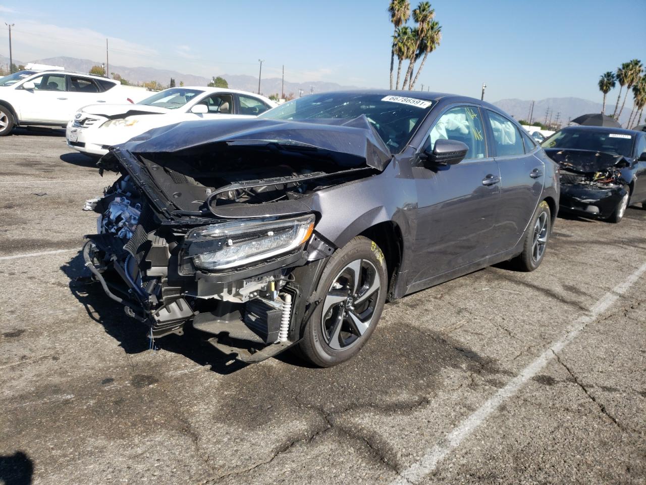 Photo 2 from auction – 2021 HONDA INSIGHT EX with VIN 19XZE4F55ME011303