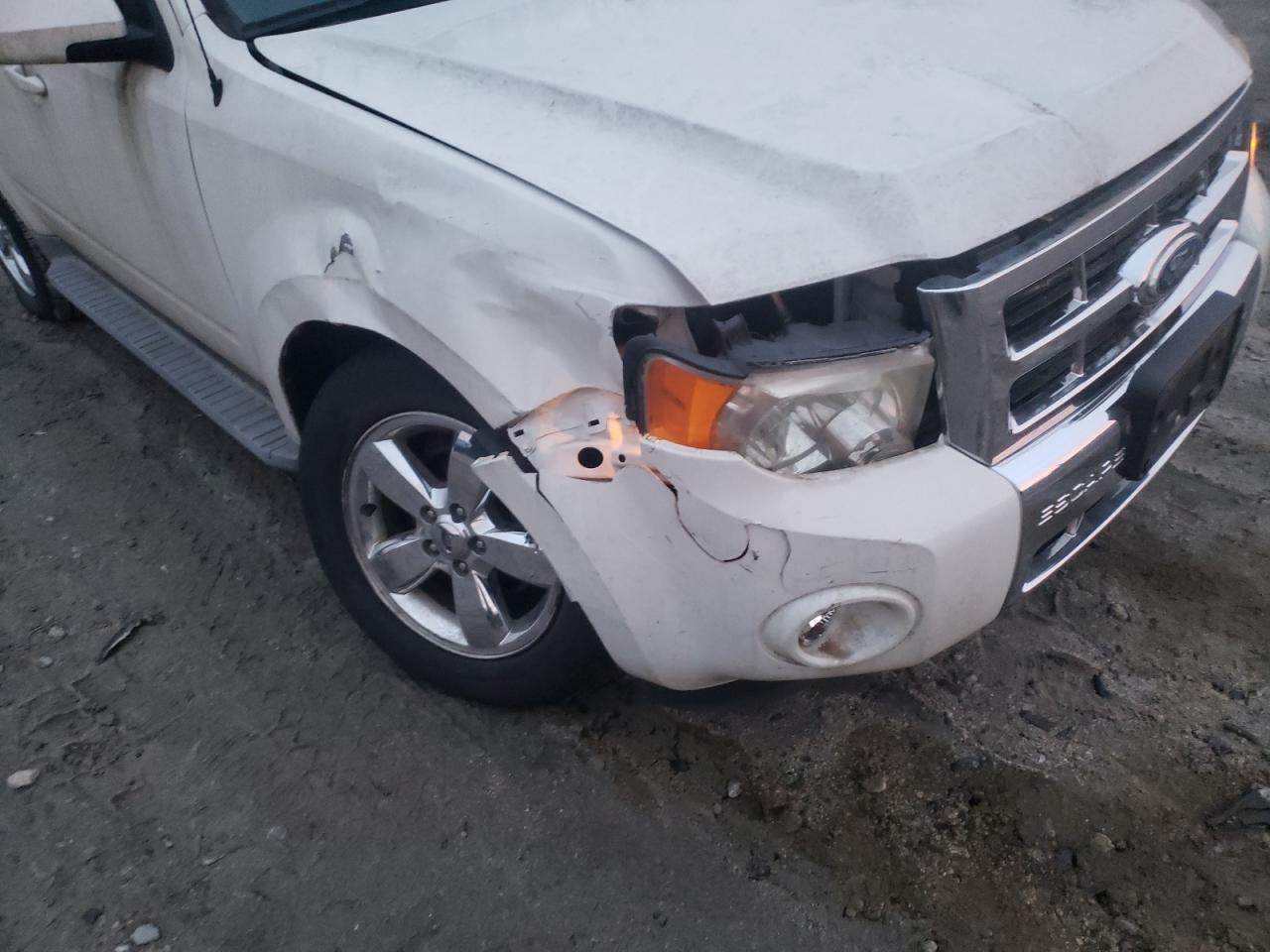 Photo 9 from auction – 2011 FORD ESCAPE LIM with VIN 1FMCU9EG9BKA77870
