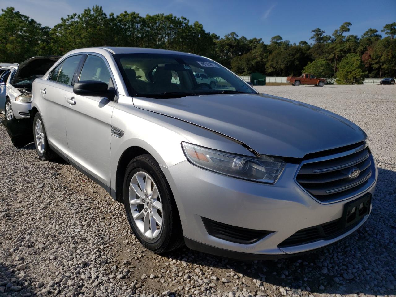 FORD TAURUS SE 2014 with VIN 1FAHP2D82EG119439 - Photo from auction