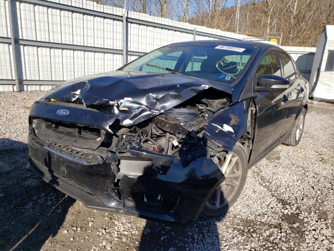 Photo 2 from auction – 2018 FORD FOCUS SE with VIN 1FADP3F24JL221811