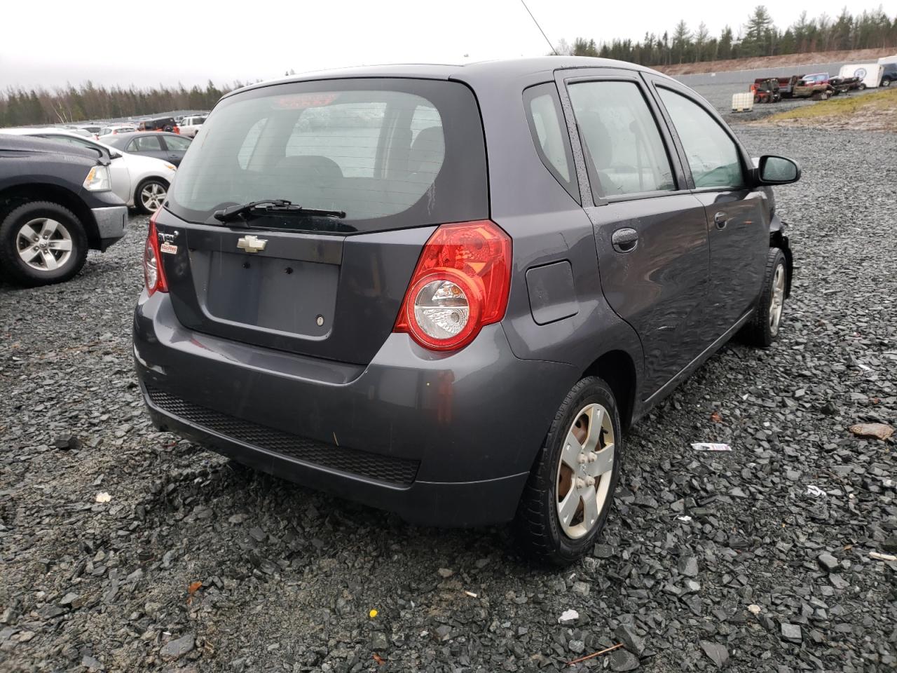 Photo 4 from auction – 2011 CHEVROLET AVEO LS with VIN 3G1TB6DG7BL150672