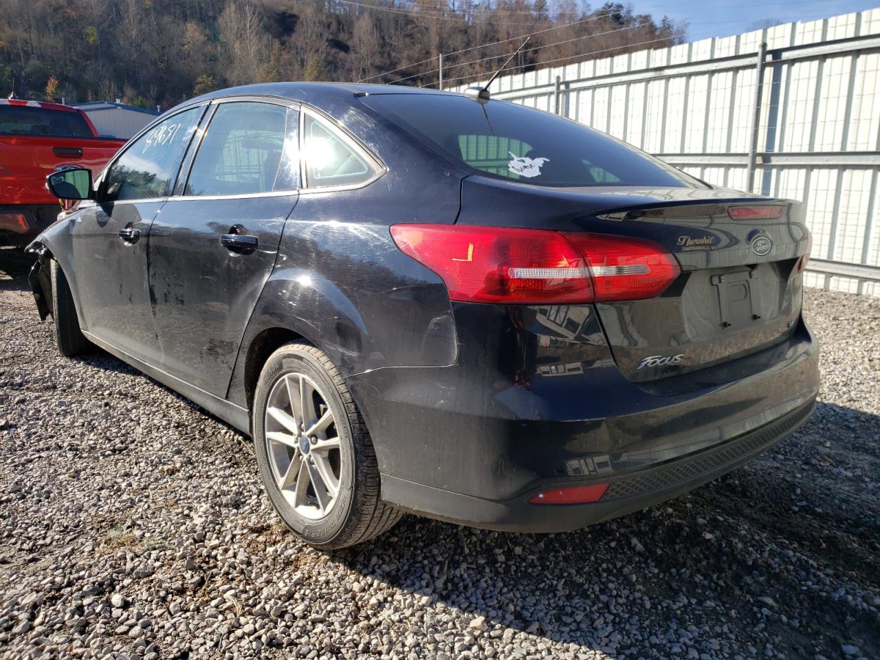 Photo 3 from auction – 2018 FORD FOCUS SE with VIN 1FADP3F24JL221811
