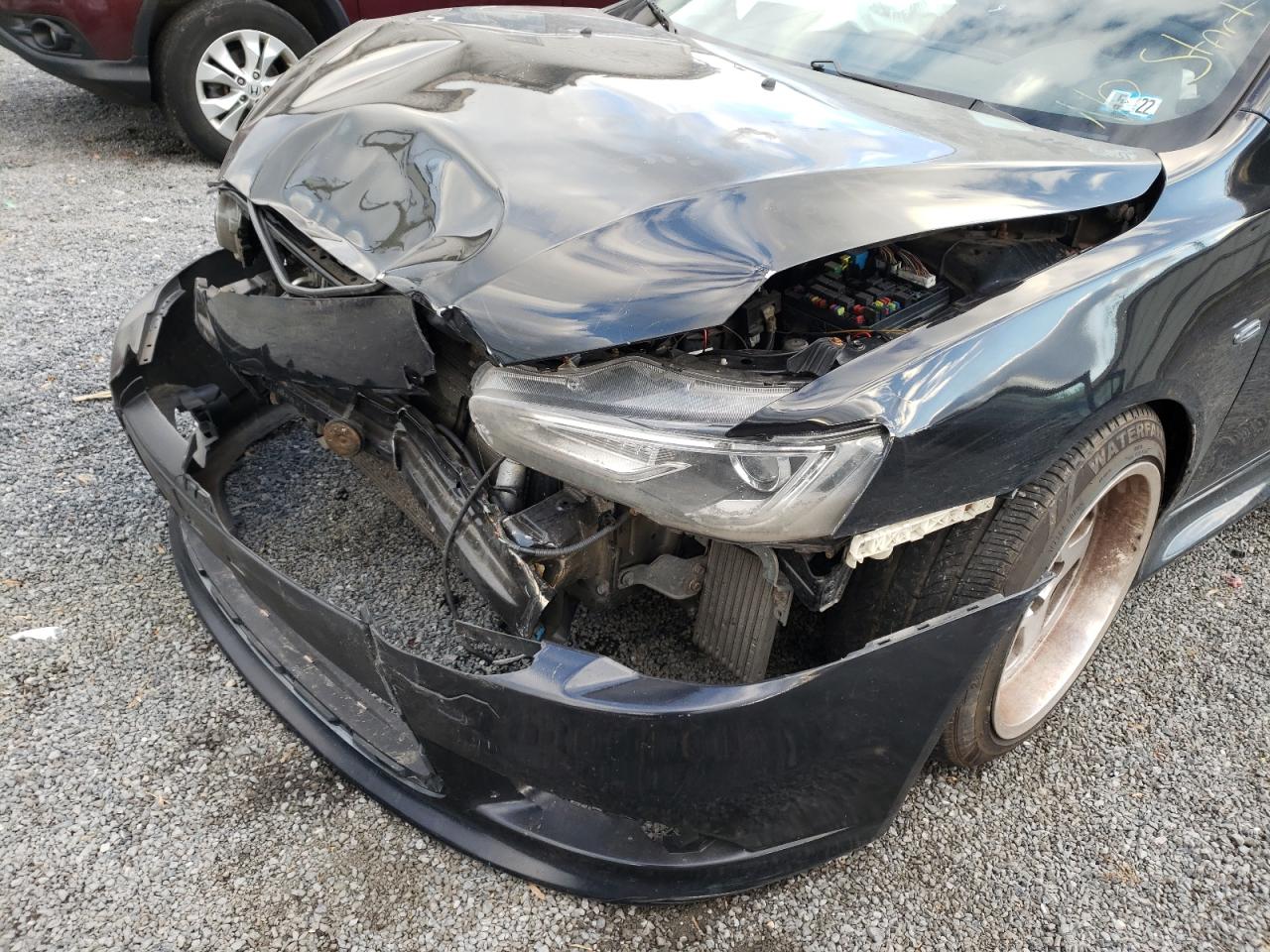 Photo 9 from auction – 2015 MITSUBISHI LANCER SE with VIN JA32V2FW4FU012167