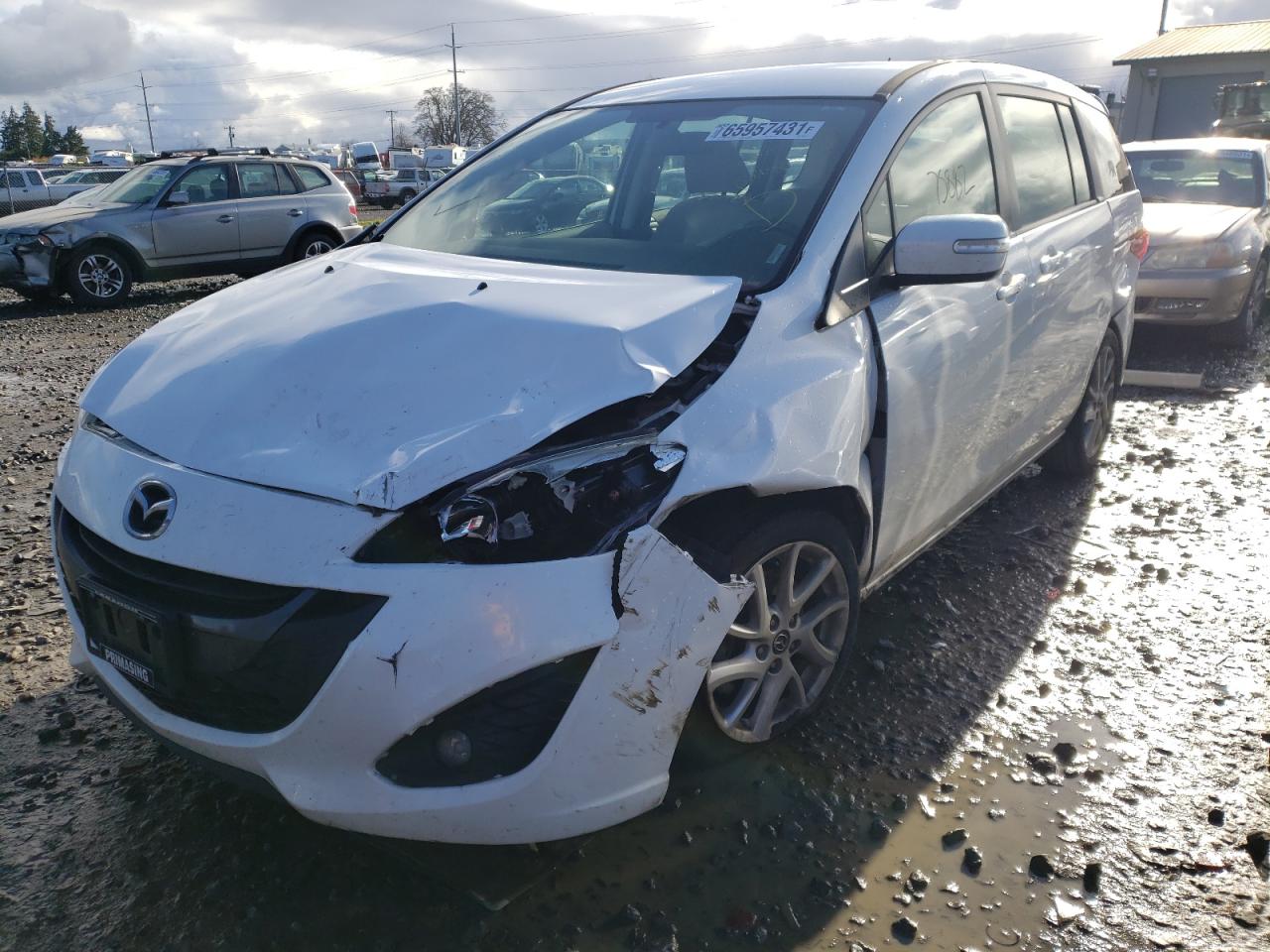 Photo 2 from auction – 2015 MAZDA 5 TOURING with VIN JM1CW2CL6F0188500