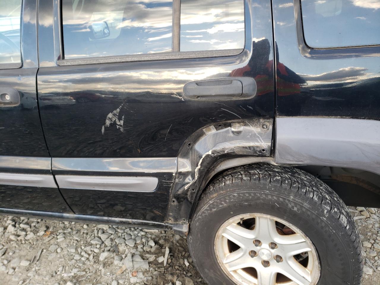 Photo 9 from auction – 2003 JEEP LIBERTY SP with VIN 1J4GL48K33W718947