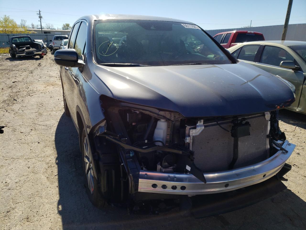 HONDA PILOT EXL 2021 with VIN 5FNYF5H53MB024587 - Photo from auction