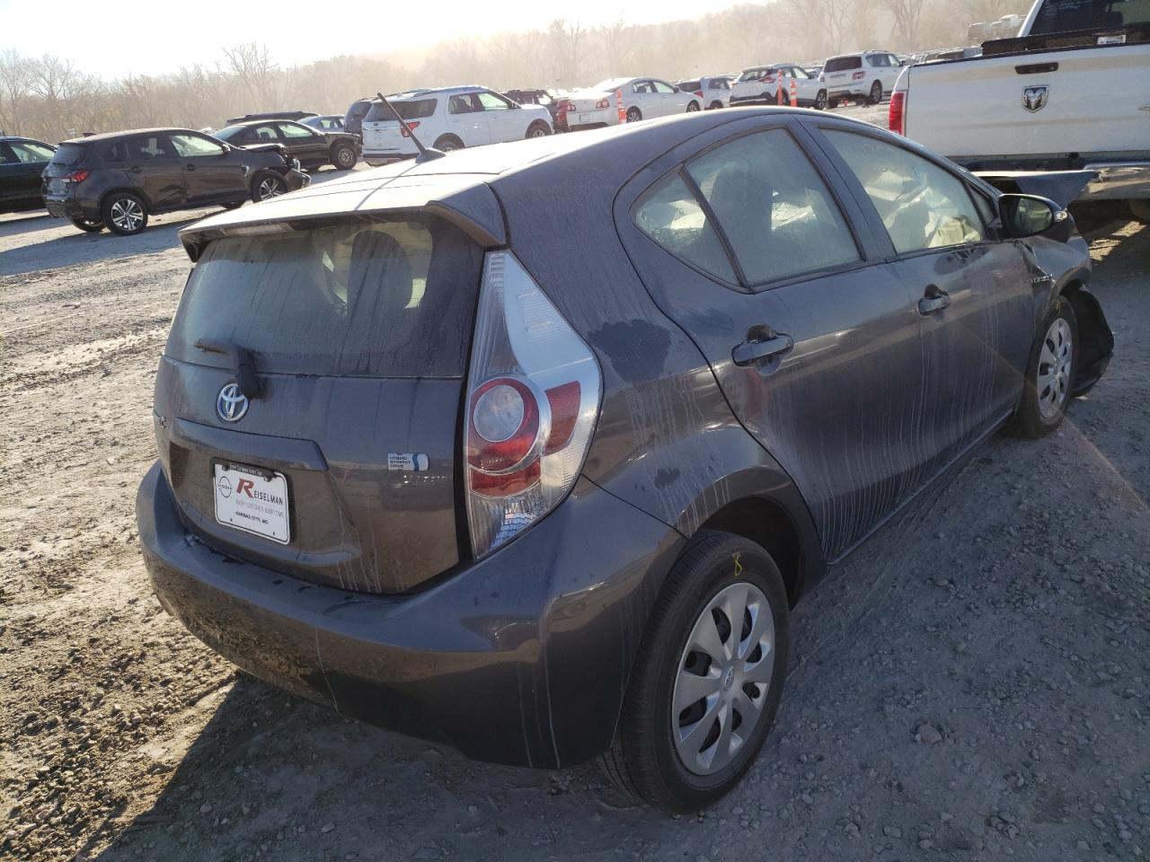 Photo 4 from auction – 2014 TOYOTA PRIUS C with VIN JTDKDTB38E1084012