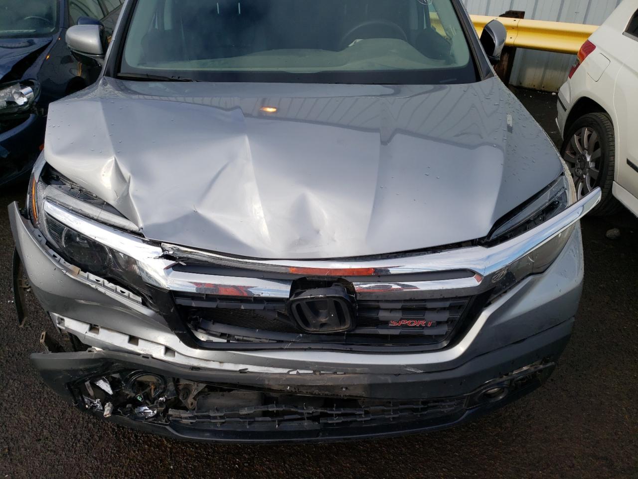 Photo 7 from auction – 2019 HONDA RIDGELINE with VIN 5FPYK3F11KB046902