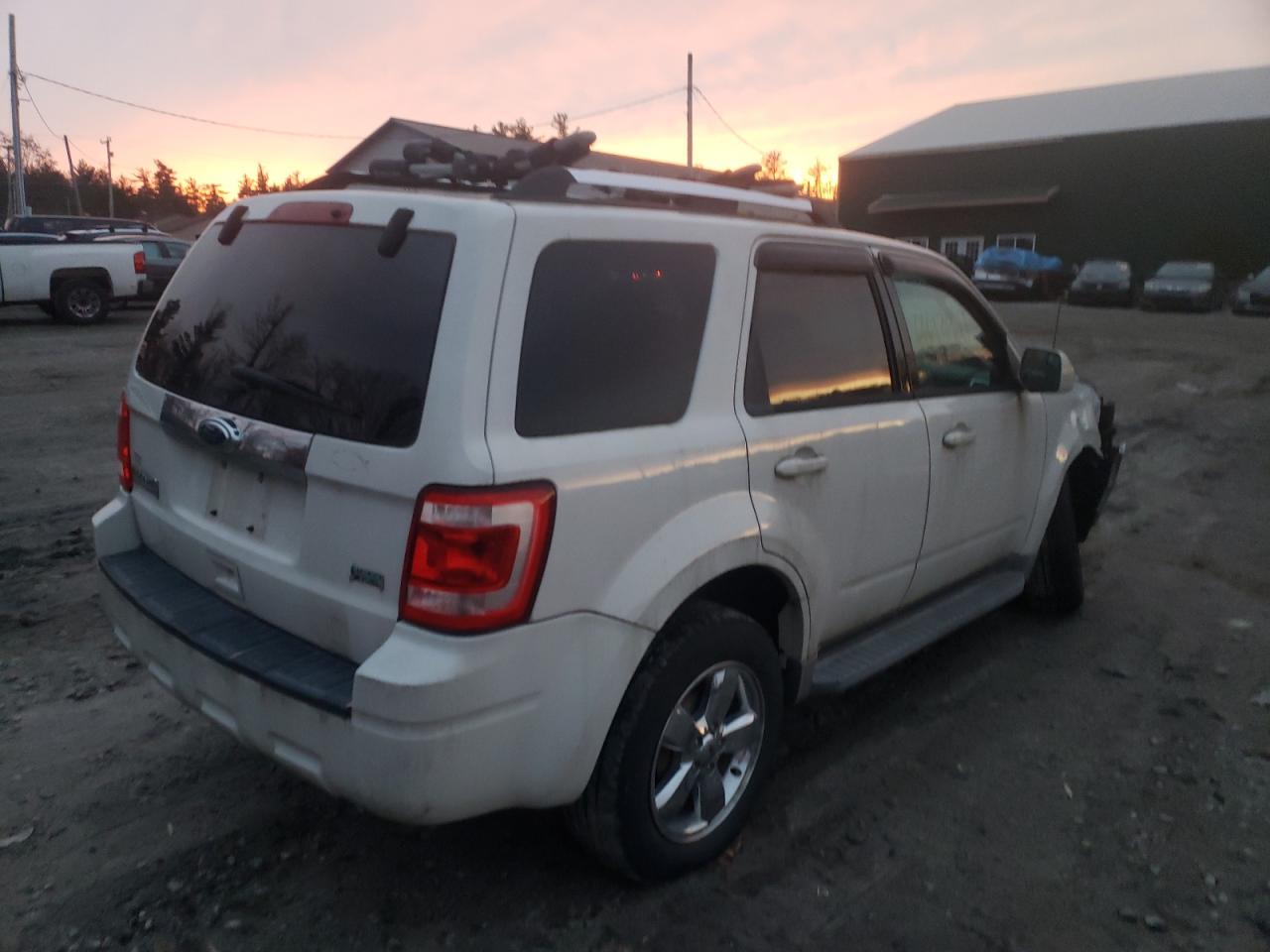 Photo 4 from auction – 2011 FORD ESCAPE LIM with VIN 1FMCU9EG9BKA77870