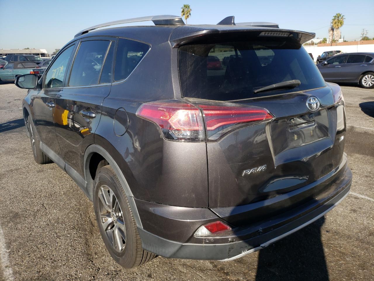 Photo 3 from auction – 2016 TOYOTA RAV4 XLE with VIN 2T3WFREV5GW271613
