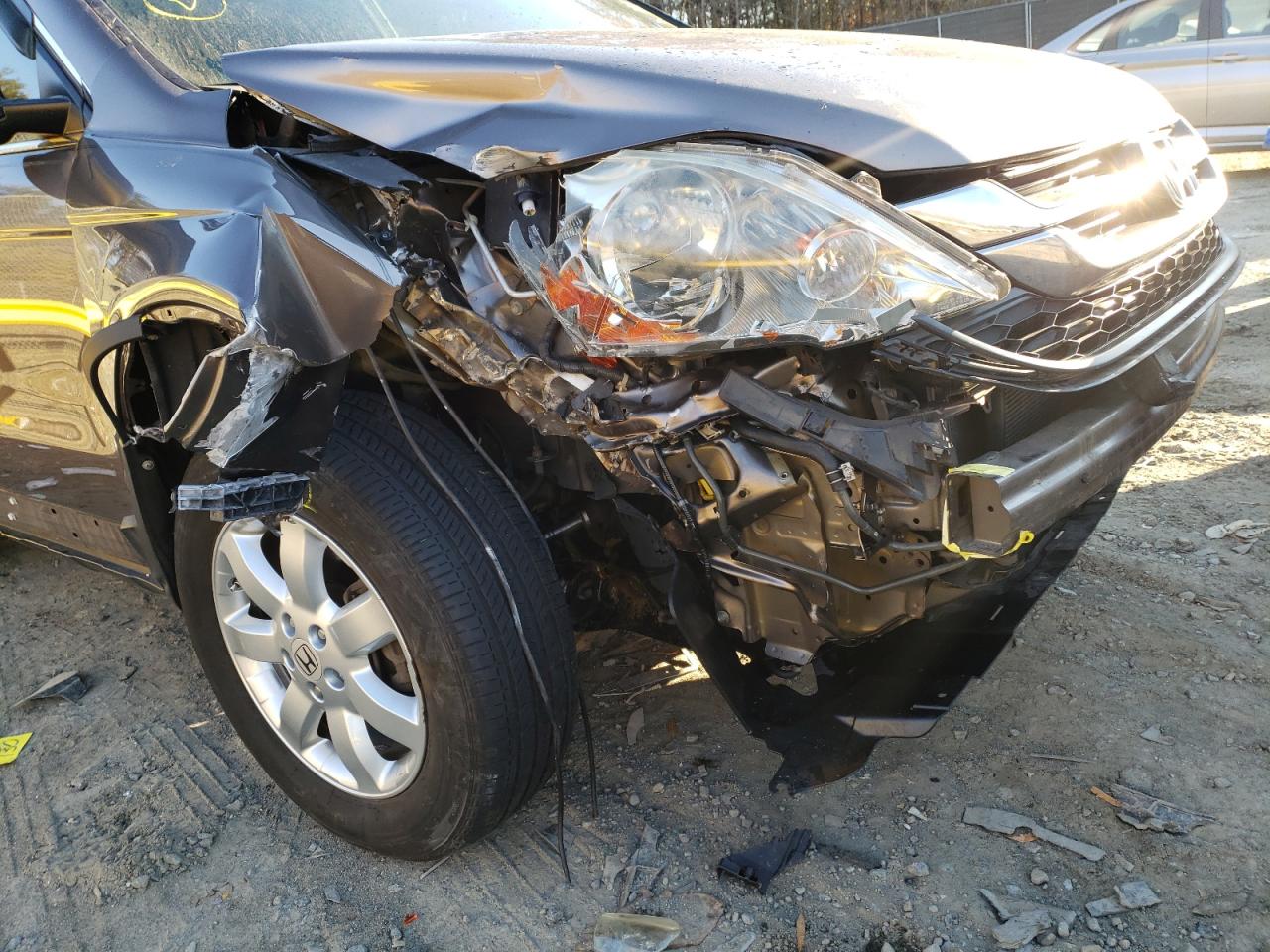 Photo 9 from auction – 2011 HONDA CR-V SE with VIN 5J6RE4H45BL021820