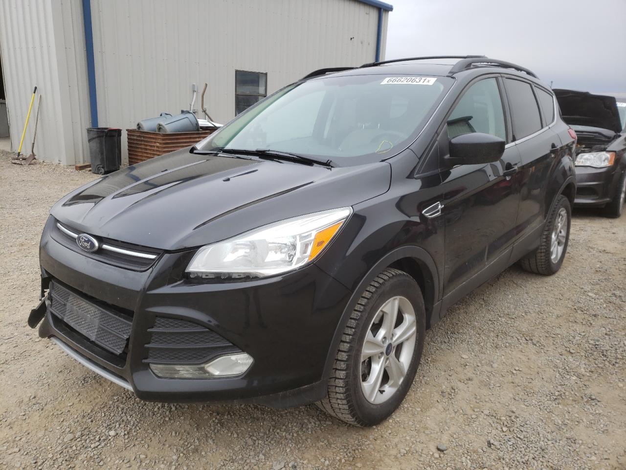 Photo 2 from auction – 2013 FORD ESCAPE SE with VIN 1FMCU9G92DUD40187