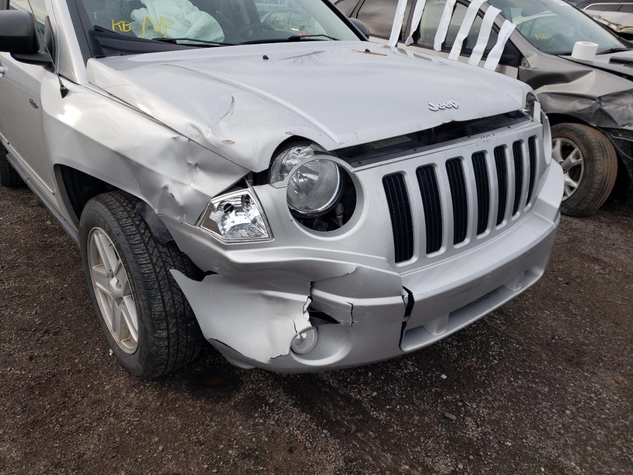 Photo 9 from auction – 2010 JEEP COMPASS SP with VIN 1J4NF4FB4AD653794