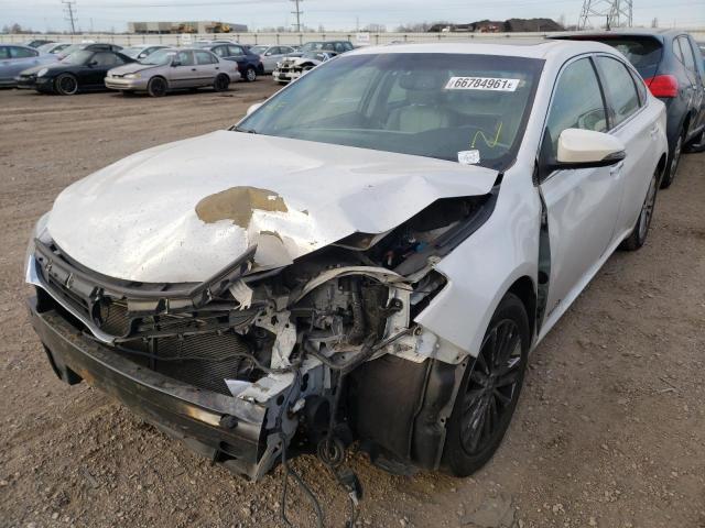 Photo 2 from auction – 2014 TOYOTA AVALON HYB with VIN 4T1BD1EB9EU033863