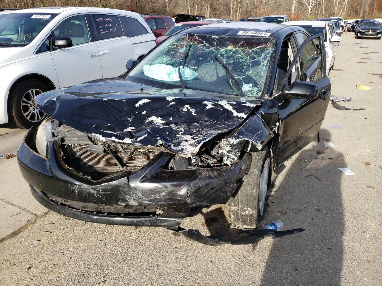 Photo 2 from auction – 2003 MAZDA 6 I with VIN 1YVFP80C135M44973