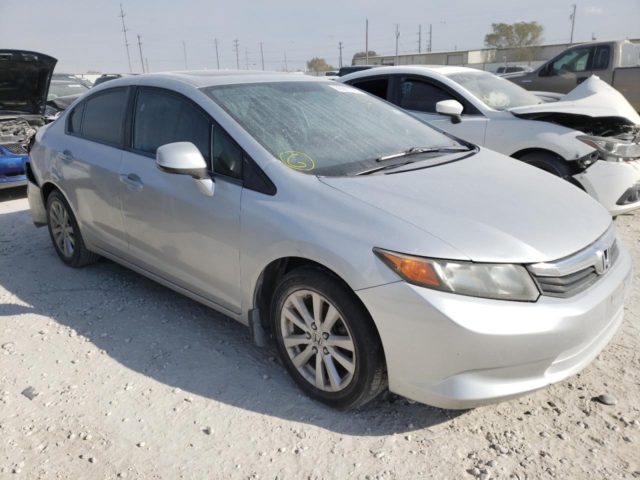 HONDA CIVIC EXL 2012 with VIN 2HGFB2F94CH519141 - Photo from auction