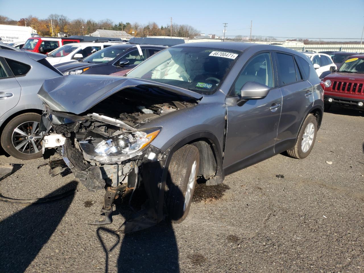 Photo 2 from auction – 2013 MAZDA CX-5 TOURI with VIN JM3KE4CE2D0168843