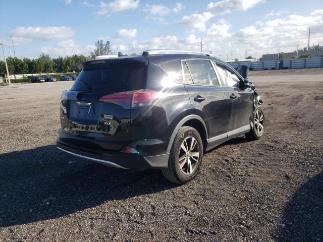 Photo 4 from auction – 2016 TOYOTA RAV4 XLE with VIN 2T3WFREV9GW292870