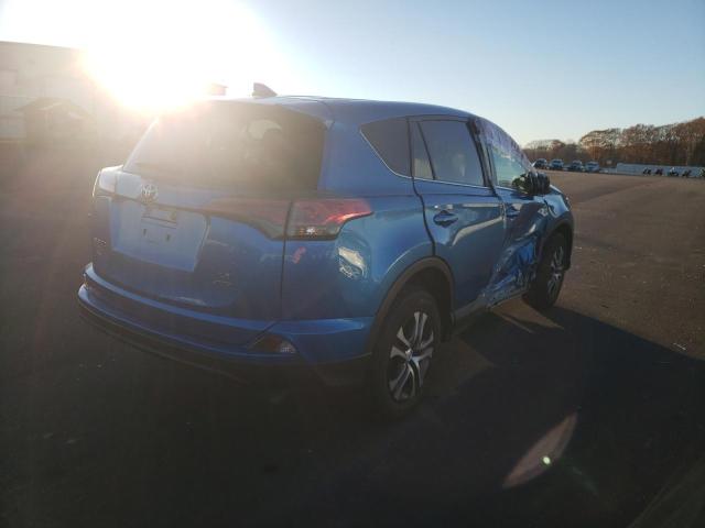 Photo 4 from auction – 2018 TOYOTA RAV4 LE with VIN JTMBFREV9JJ178498