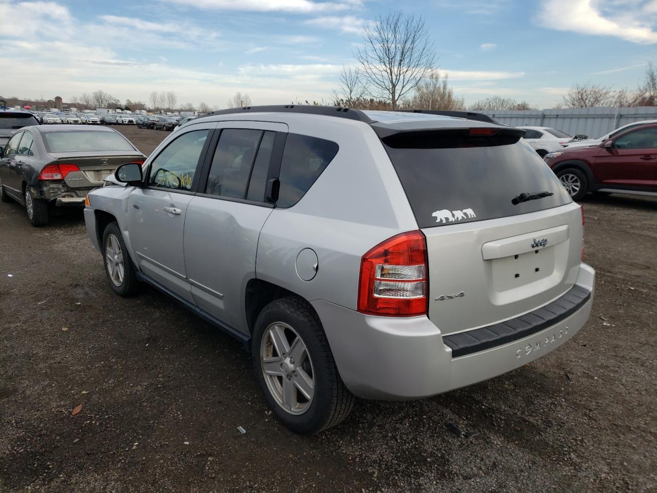 Photo 3 from auction – 2010 JEEP COMPASS SP with VIN 1J4NF4FB4AD653794
