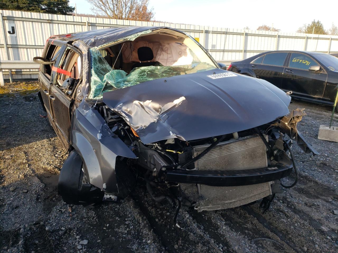 DODGE GRAND CARA 2015 with VIN 2C4RDGBG3FR517287 - Photo from auction