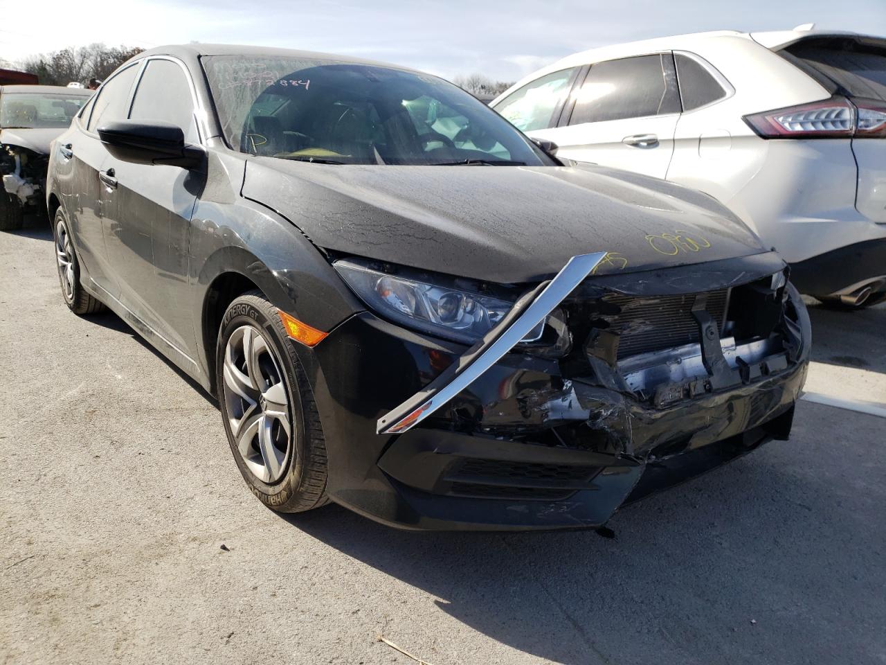 HONDA CIVIC LX 2018 with VIN 2HGFC2F53JH569231 - Photo from auction
