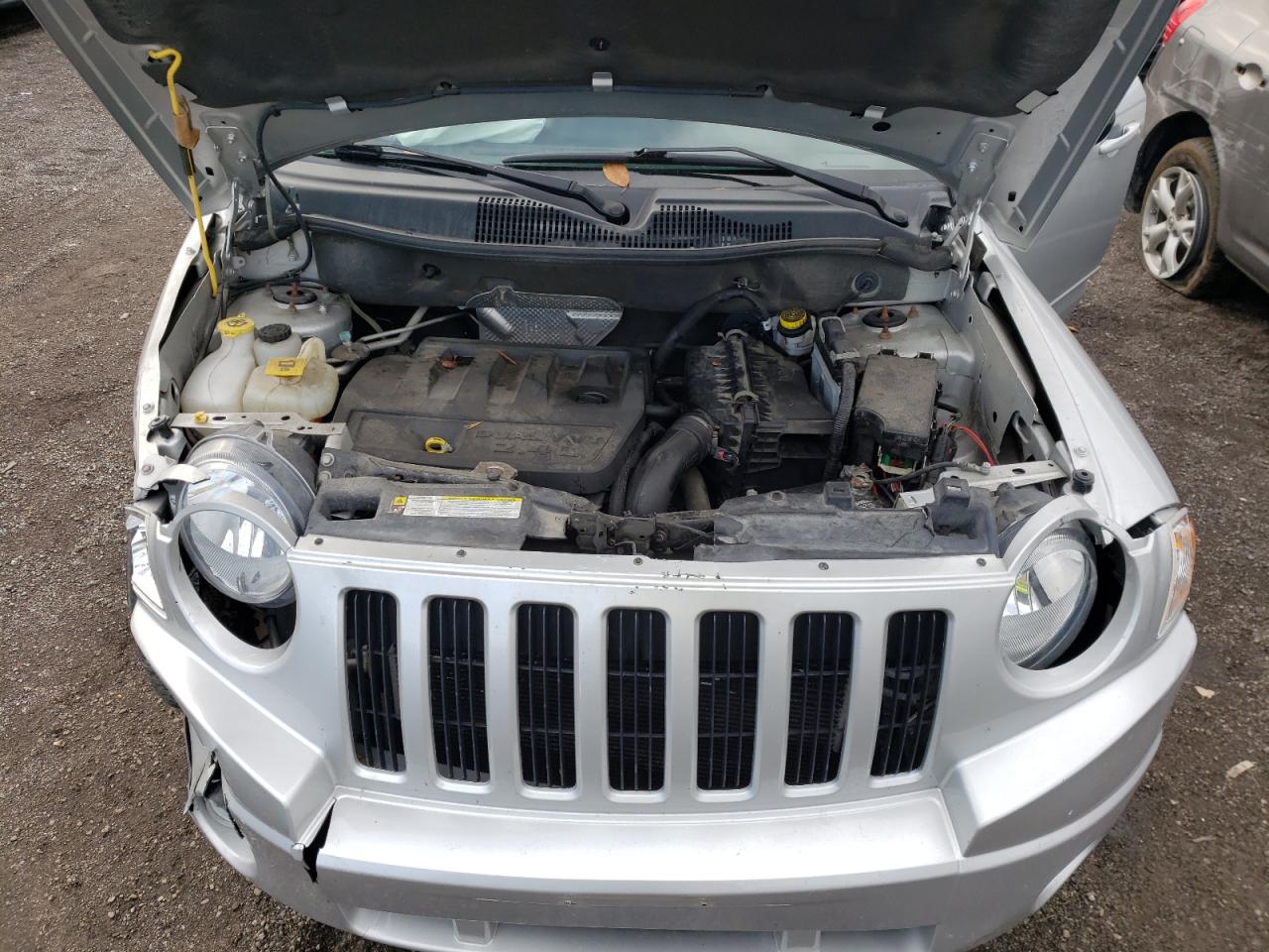 Photo 7 from auction – 2010 JEEP COMPASS SP with VIN 1J4NF4FB4AD653794