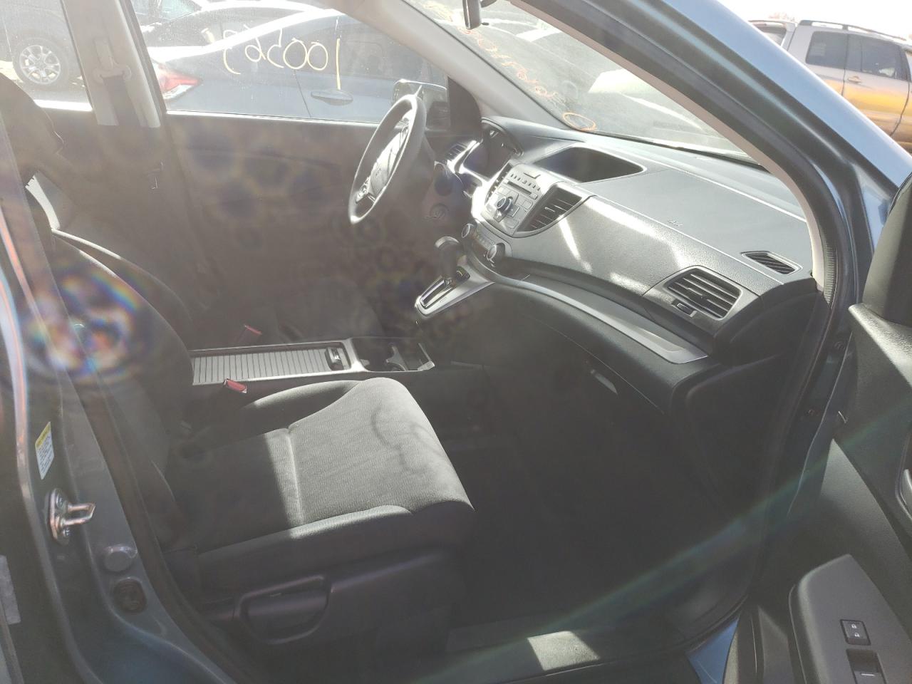 Photo 5 from auction – 2014 HONDA CR-V LX with VIN 5J6RM4H35EL072829