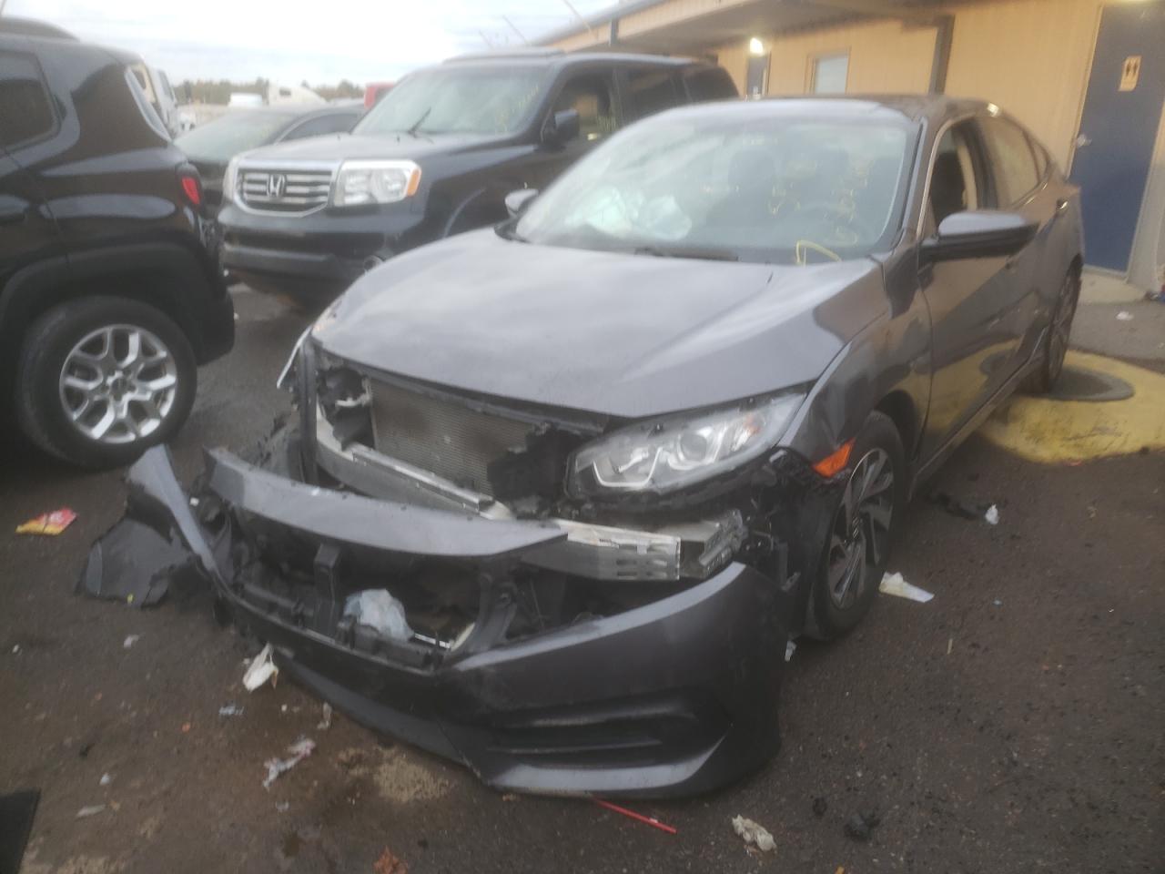Photo 2 from auction – 2018 HONDA CIVIC EX with VIN 2HGFC2F74JH581468