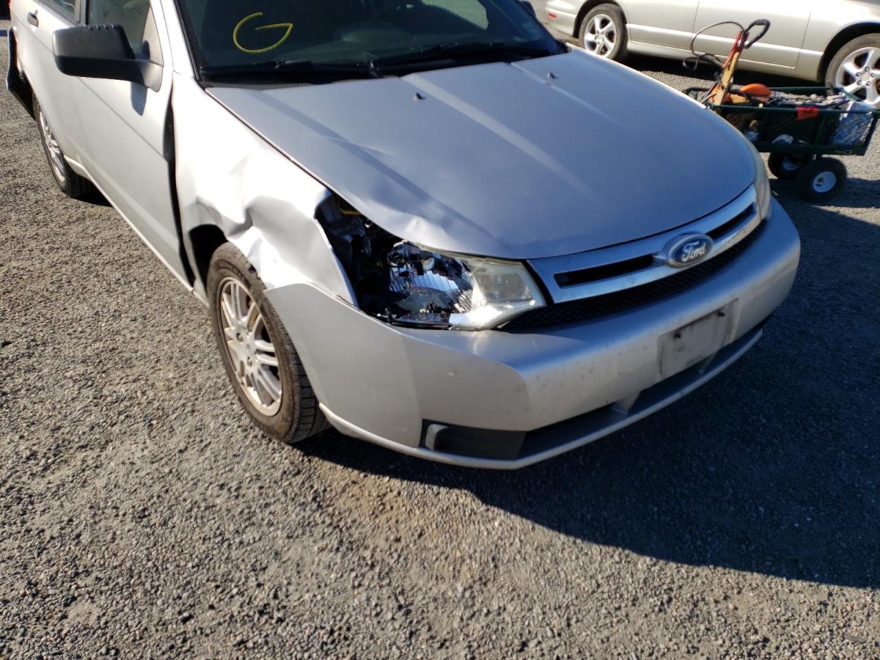 Photo 9 from auction – 2011 FORD FOCUS SE with VIN 1FAHP3FNXBW142963