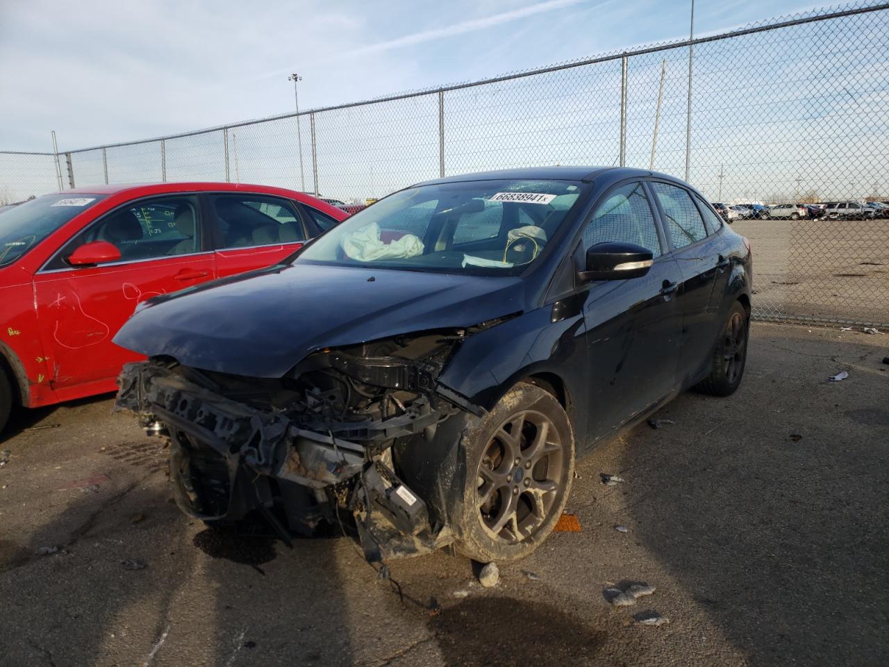 Photo 2 from auction – 2014 FORD FOCUS SE with VIN 1FADP3F29EL329928