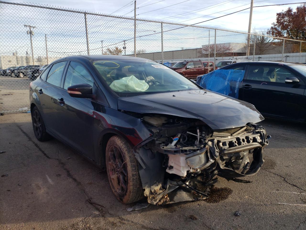 FORD FOCUS SE 2014 with VIN 1FADP3F29EL329928 - Photo from auction