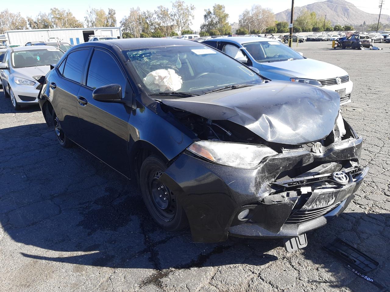 TOYOTA COROLLA L 2015 with VIN 2T1BURHE8FC416619 - Photo from auction