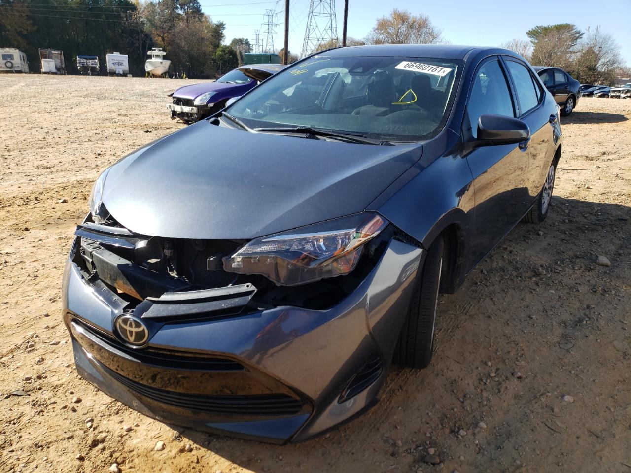 Photo 2 from auction – 2017 TOYOTA COROLLA L with VIN 5YFBURHEXHP688771