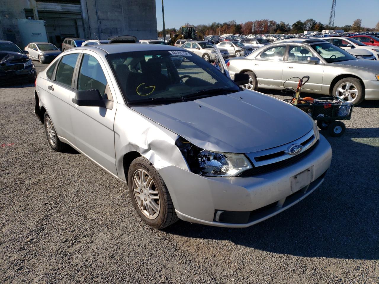 FORD FOCUS SE 2011 with VIN 1FAHP3FNXBW142963 - Photo from auction