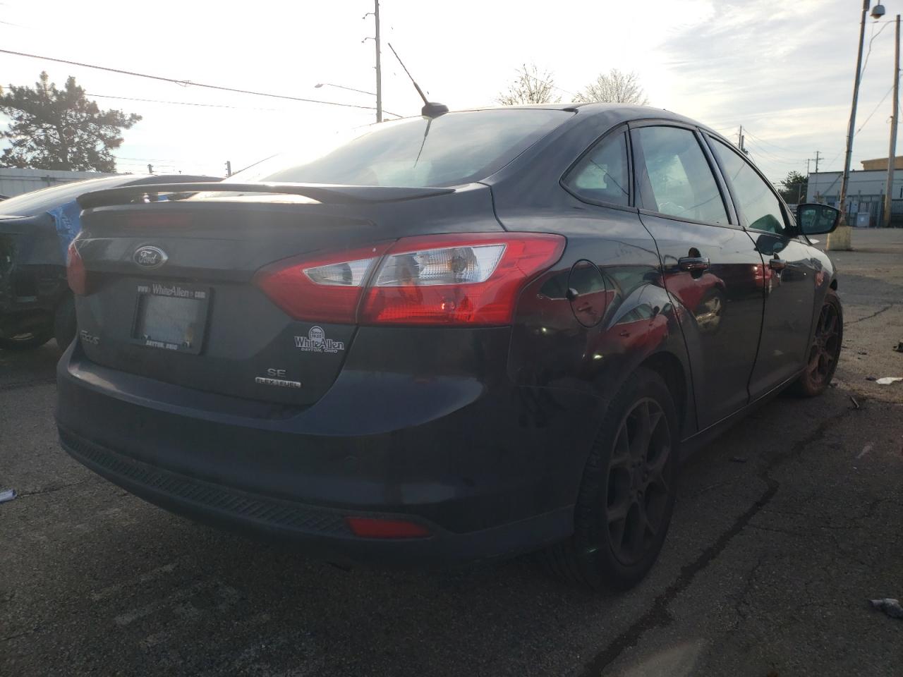 Photo 4 from auction – 2014 FORD FOCUS SE with VIN 1FADP3F29EL329928