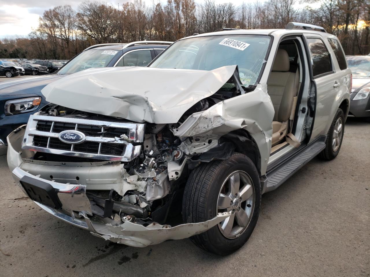 Photo 2 from auction – 2009 FORD ESCAPE LIM with VIN 1FMCU94G39KA62728