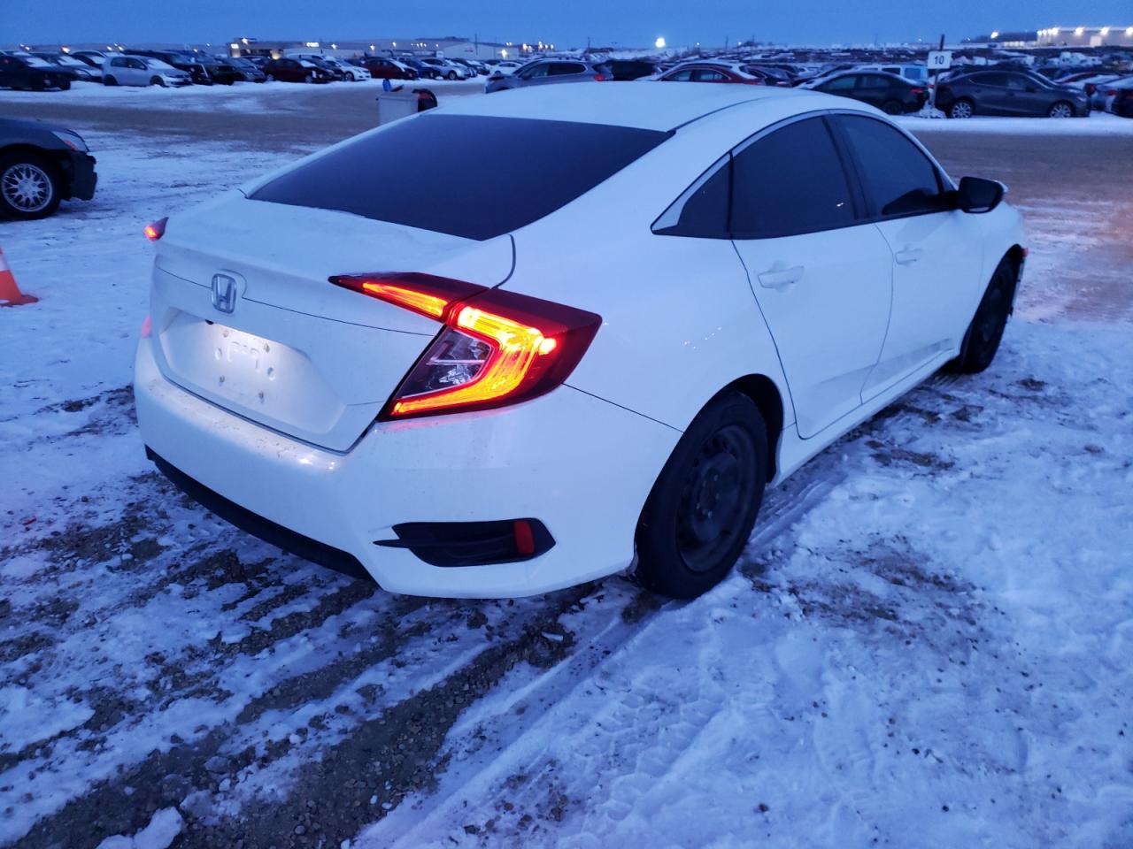 Photo 4 from auction – 2017 HONDA CIVIC LX with VIN 2HGFC2F53HH008778
