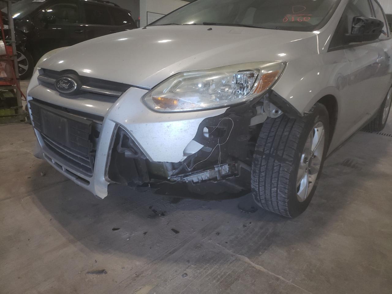 Photo 9 from auction – 2013 FORD FOCUS SE with VIN 1FADP3F28DL340160