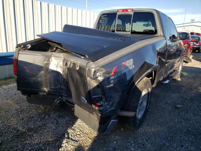 Photo 4 from auction – 2002 FORD F150 with VIN 1FTRX18L32NB20954