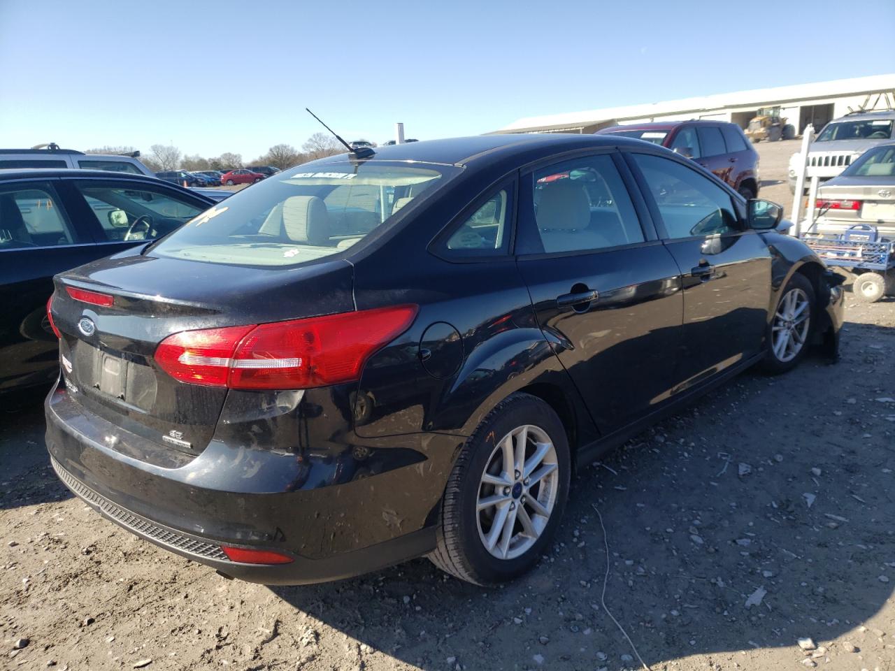 Foto 4 de la subasta – 2015 FORD FOCUS SE con VIN 1FADP3F21FL262713