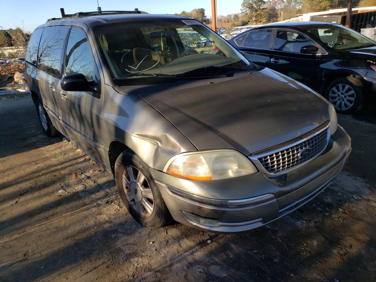 FORD WINDSTAR S 2003 with VIN 2FMZA52473BB78889 - Photo from auction