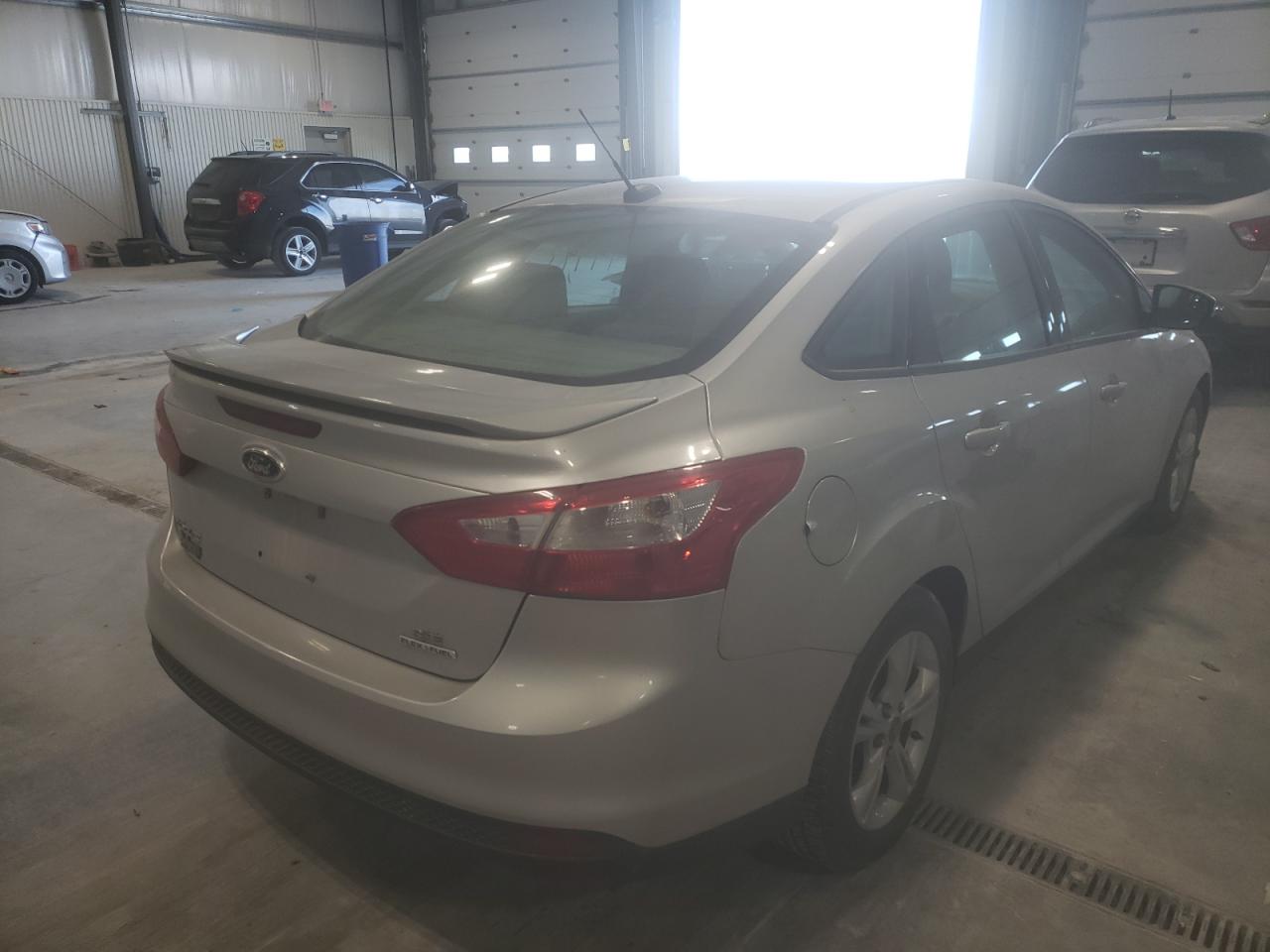 Photo 4 from auction – 2013 FORD FOCUS SE with VIN 1FADP3F28DL340160