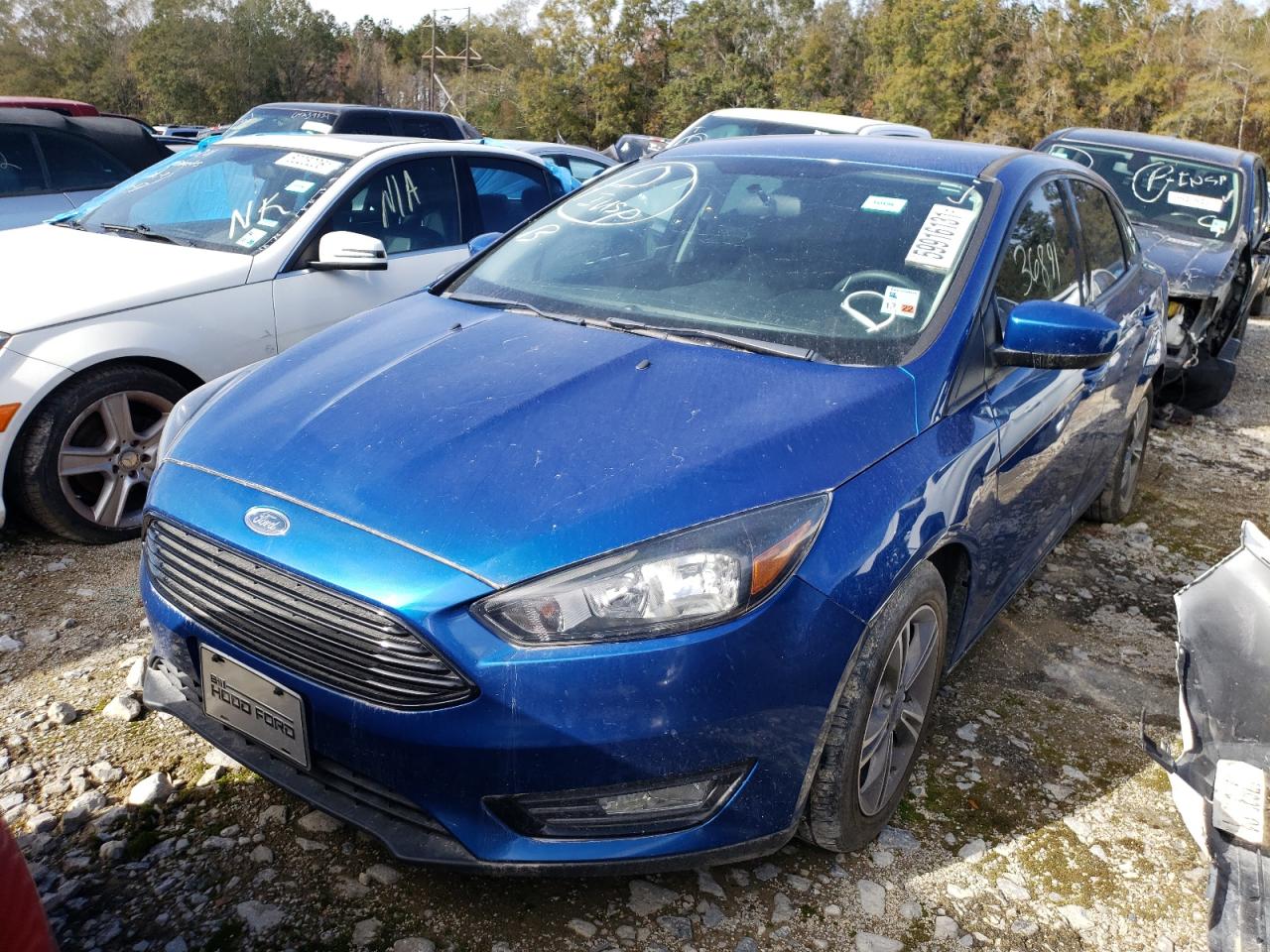 Photo 2 from auction – 2018 FORD FOCUS SE with VIN 1FADP3FE7JL302862