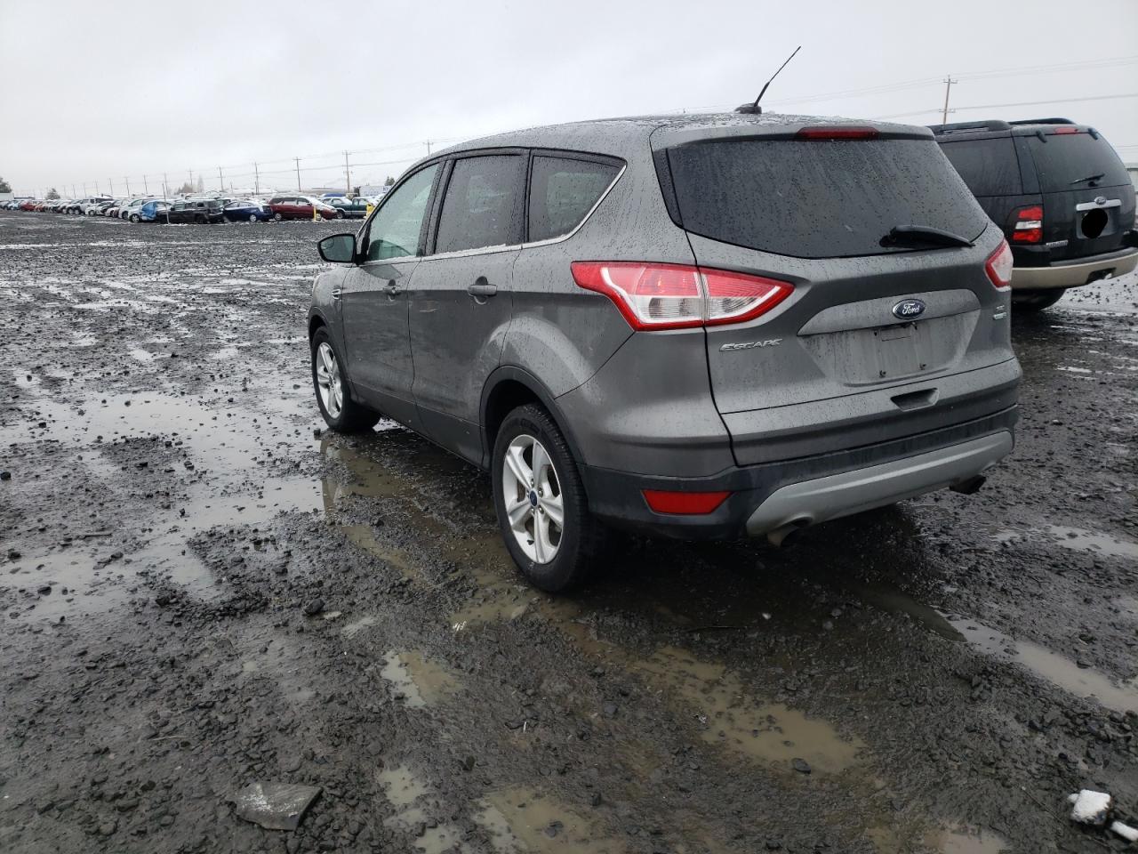 Photo 3 from auction – 2014 FORD ESCAPE with VIN 1FMCU9G98EUD11178