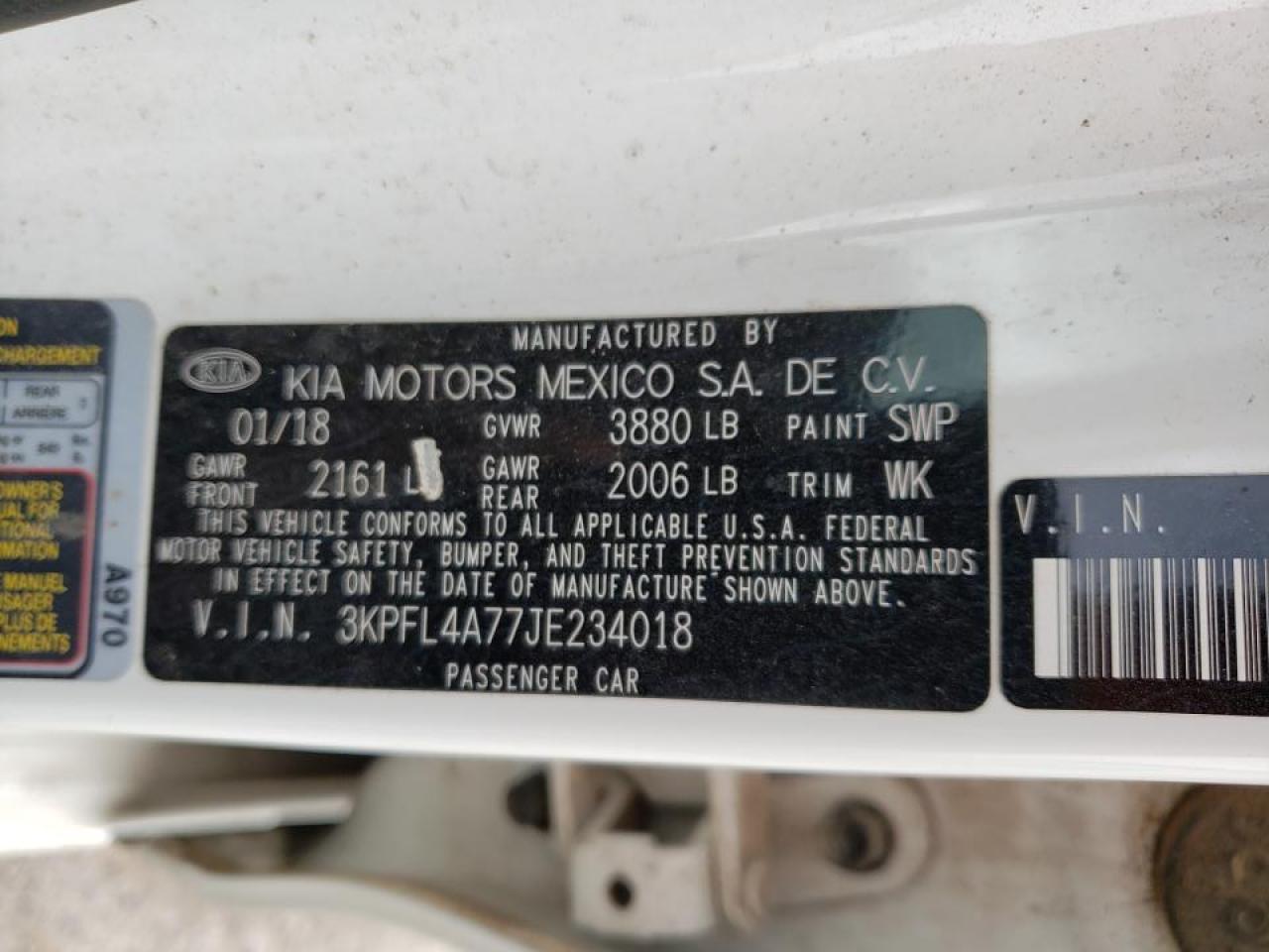 Photo 10 from auction – 2018 KIA FORTE LX with VIN 3KPFL4A77JE234018
