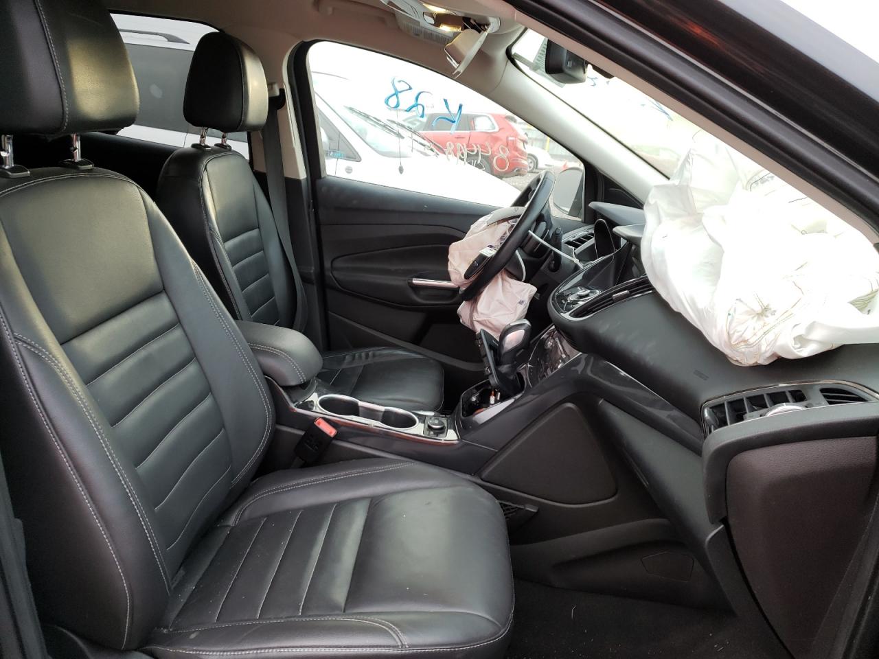 Photo 5 from auction – 2016 FORD ESCAPE TIT with VIN 1FMCU9JX3GUC65706