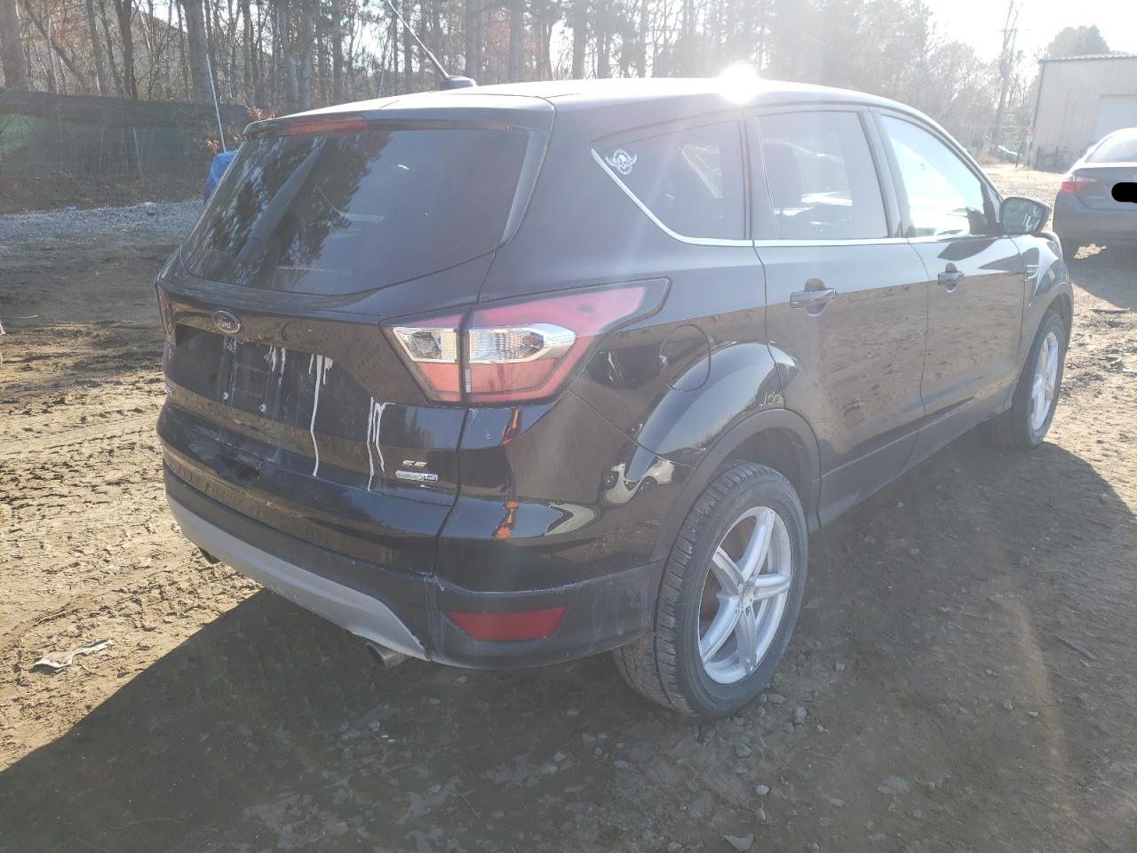 Photo 4 from auction – 2017 FORD ESCAPE SE with VIN 1FMCU9GD4HUC66944
