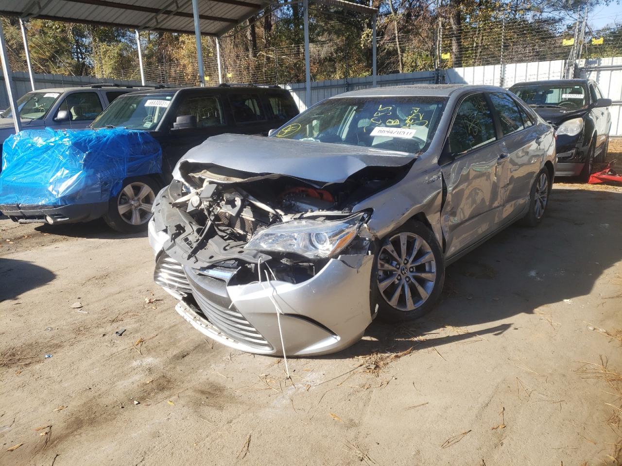 Photo 2 from auction – 2016 TOYOTA CAMRY HYBR with VIN 4T1BD1FK6GU182085